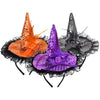 Three witch hats in orange, purple, and black on a white background